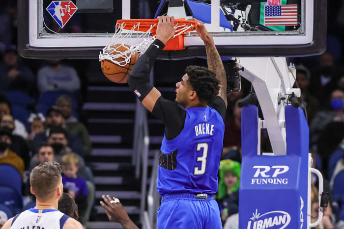 Jan 30, 2022; Orlando, Florida, USA; Orlando Magic forward Chuma Okeke (3) dunks the ball against the Dallas Mavericks during the second quarter at Amway Center. Mandatory Credit: Mike Watters-USA TODAY Sports